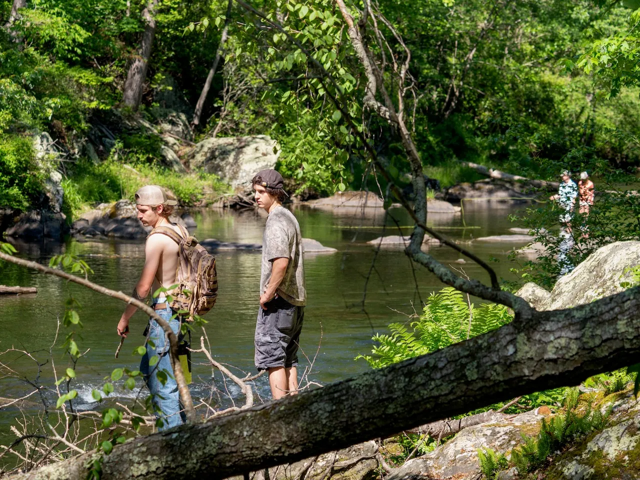 Fisherpeople at the river.
