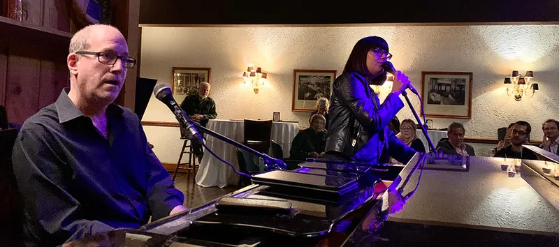 Wayne and his daughter perform at Normandie Farm, back when we could be indoors. Photo by me.